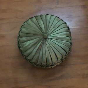 Round green throw pillow